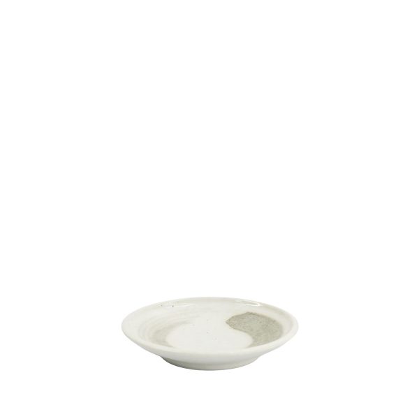 Liten japansk tallrik Yuki Kobiki. Vit med penseldrag i beige.